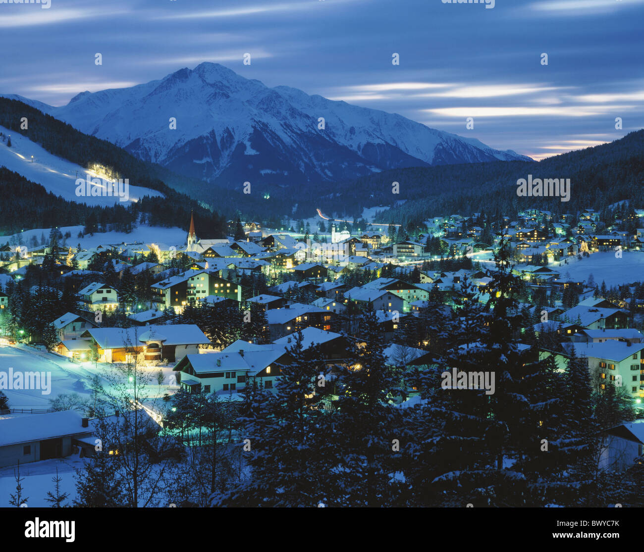 chalets at night Austria Europe Alps Seefeld ski place Tyrol overview winter Stock Photo