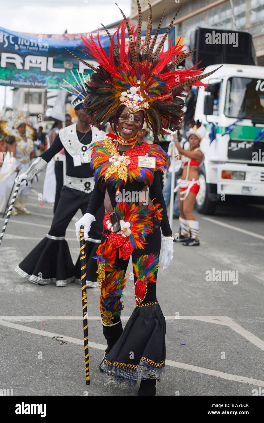 Trinidad Carnival - female masquerader in a feathered sailor costume from the band 'Vegas' Stock Photo