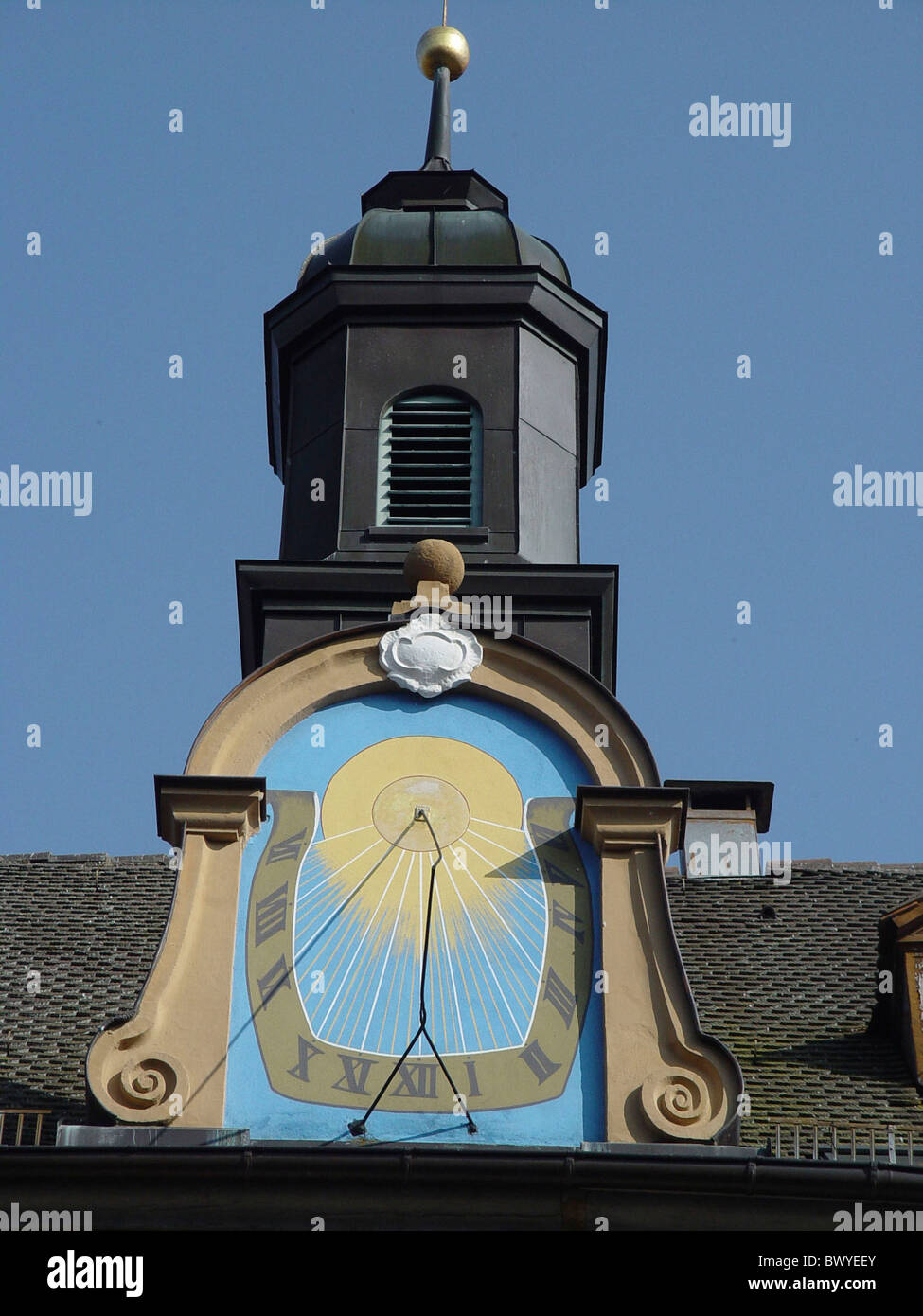 architecture roof detail building construction house home sky solar clock tower rook clock watch Stock Photo