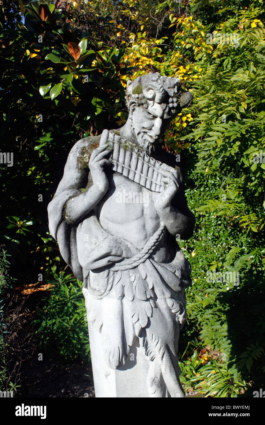 A GARDEN STATUE OF PAN THE GREEK GOD OF SHEPHERDS AND MUSIC. RHS WISLEY UK  Stock Photo - Alamy