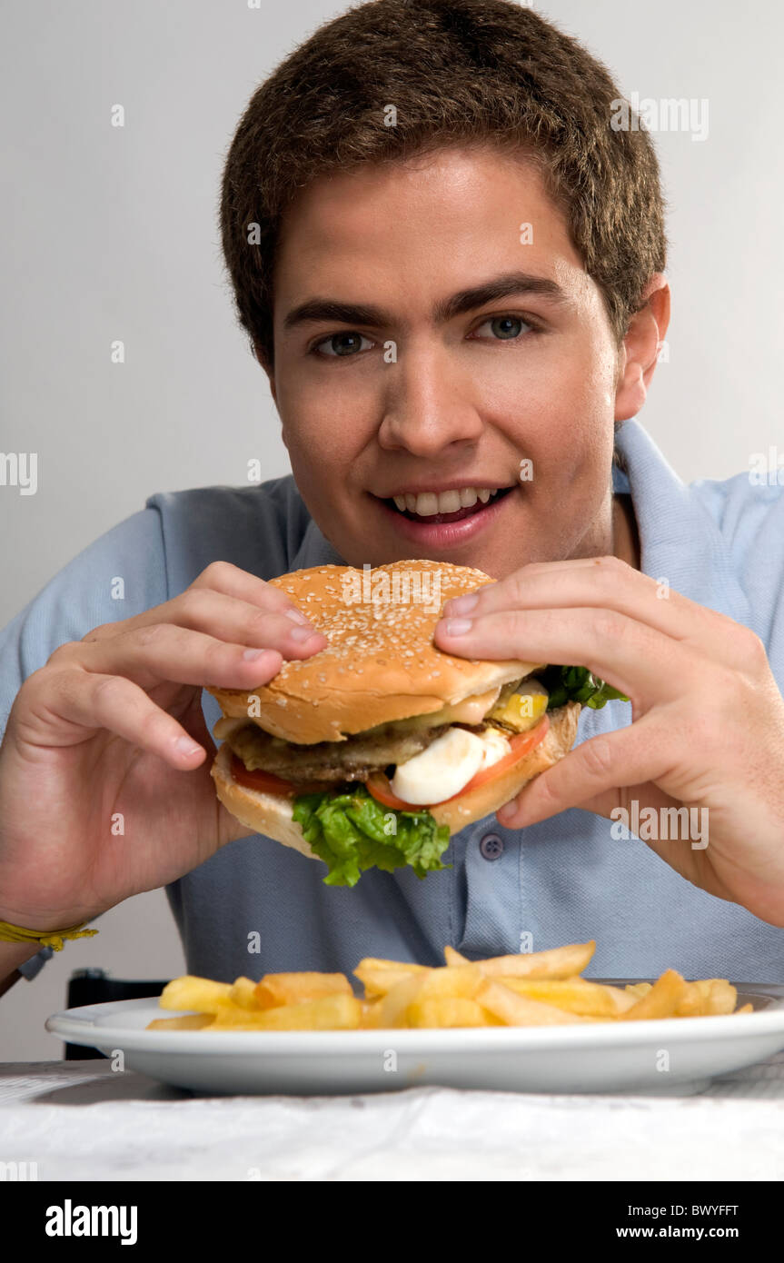 Man eating giant burger hi-res stock photography and images - Alamy