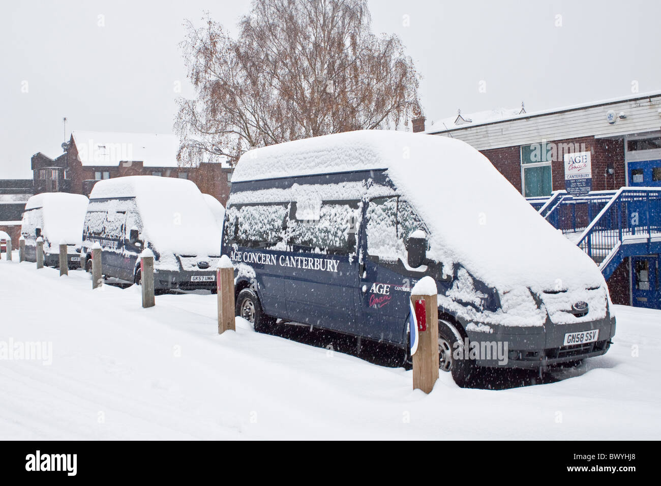 Age Concern Mini buses stranded in snow at Age Concern headquarters in Canterbury. Stock Photo