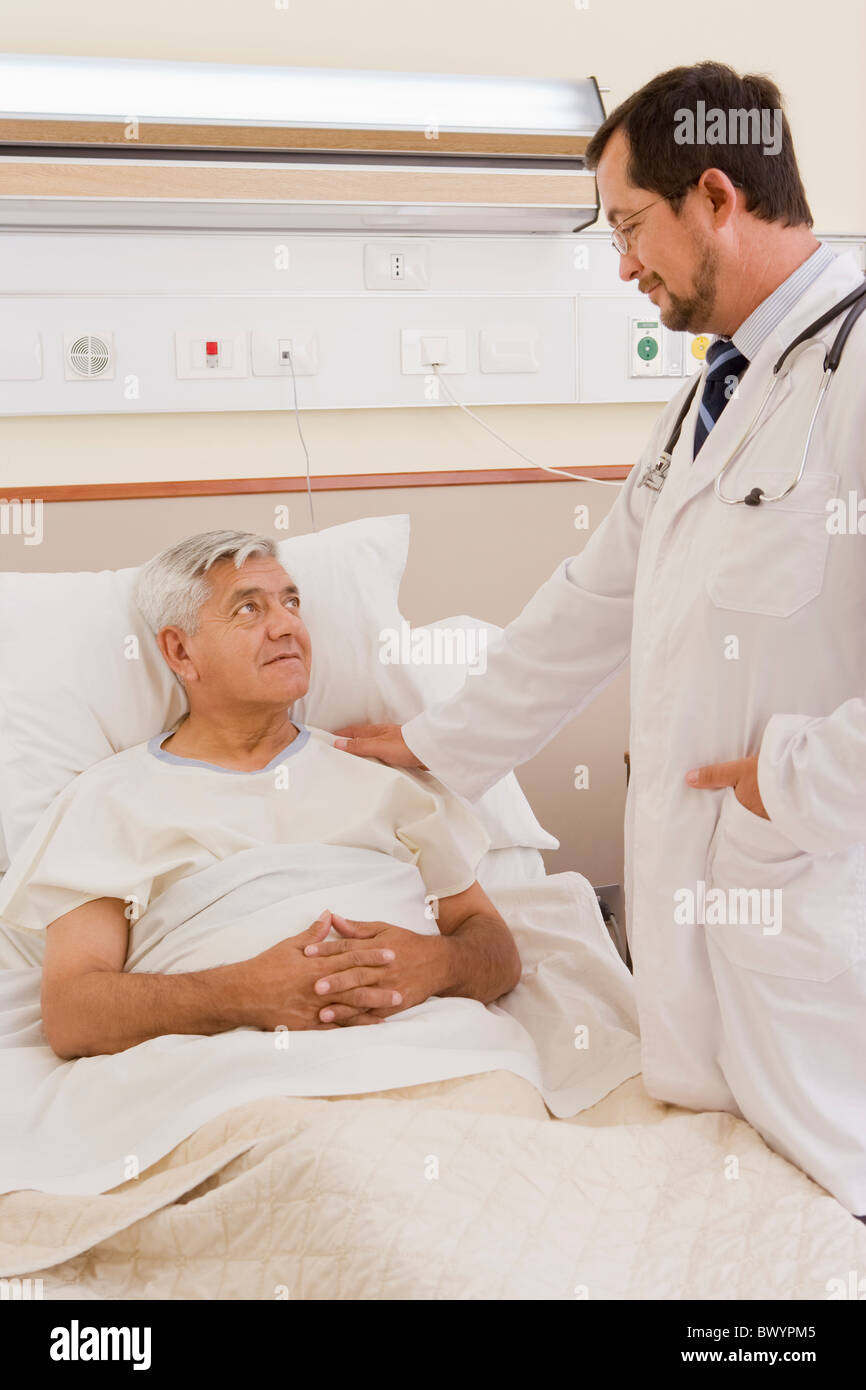 Doctor in hospital room talking hi-res stock photography and images - Alamy
