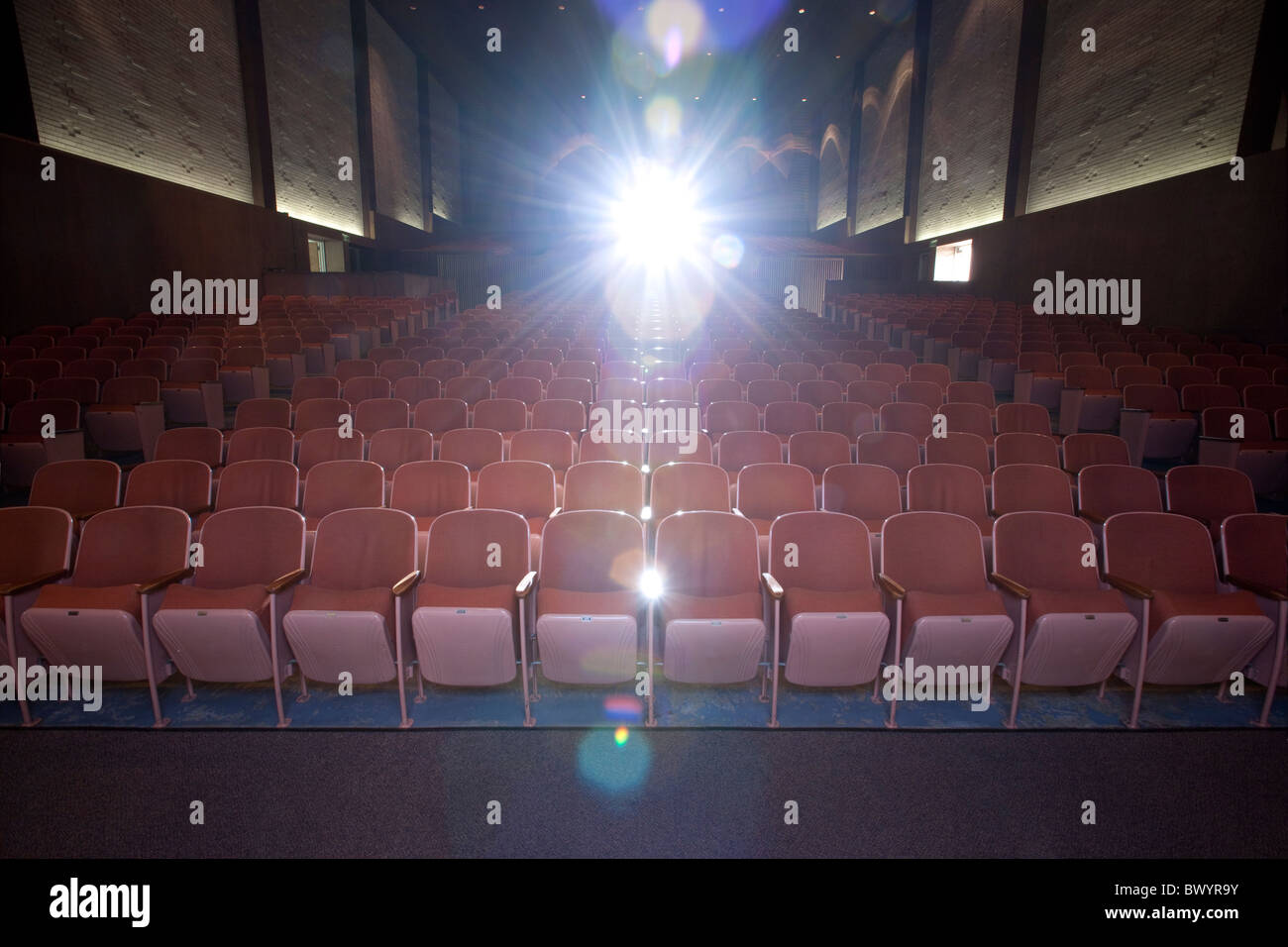 Lens flare in empty movie theater Stock Photo