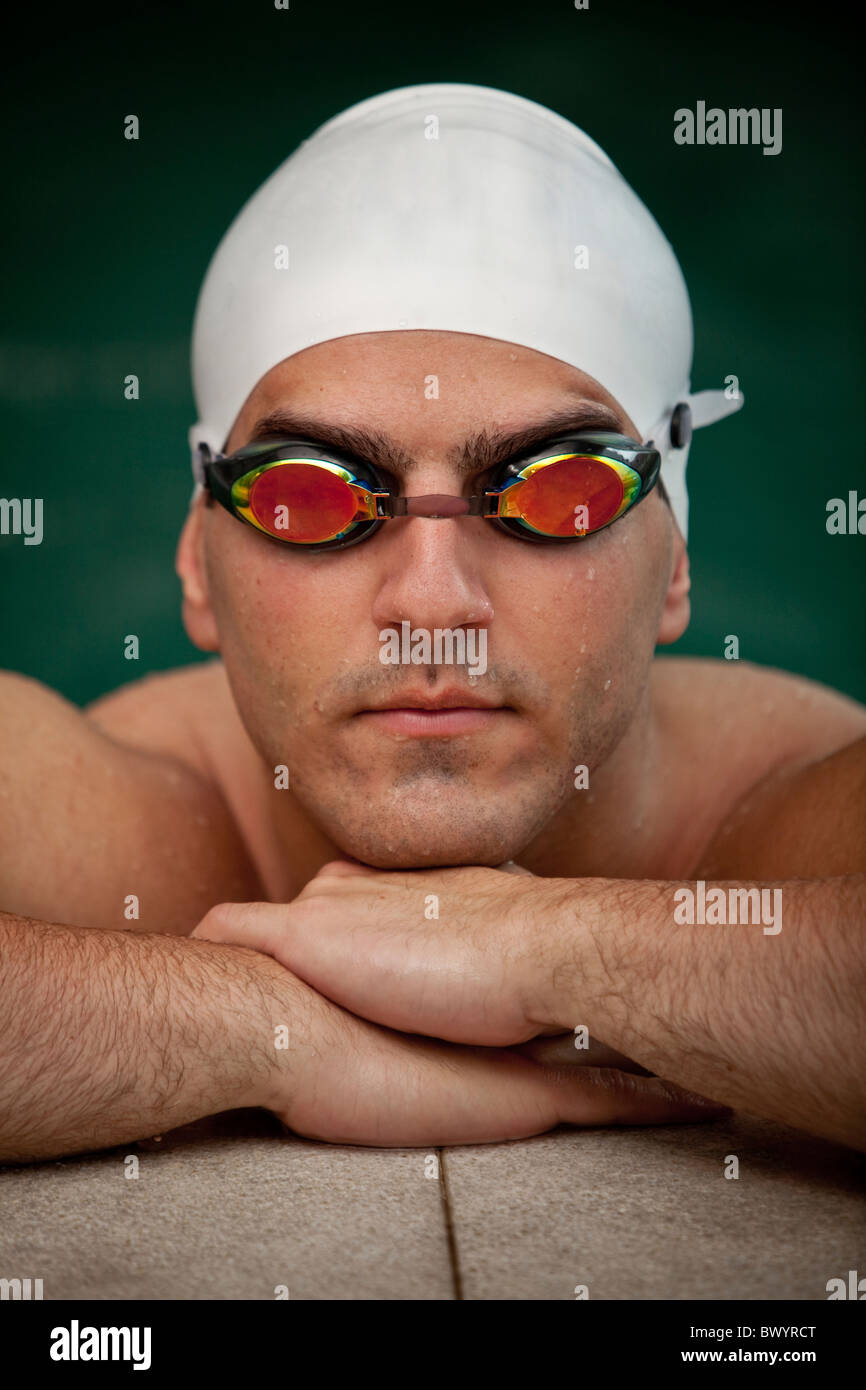 Serious Middle Eastern swimmer in swim cap and goggles Stock Photo Alamy