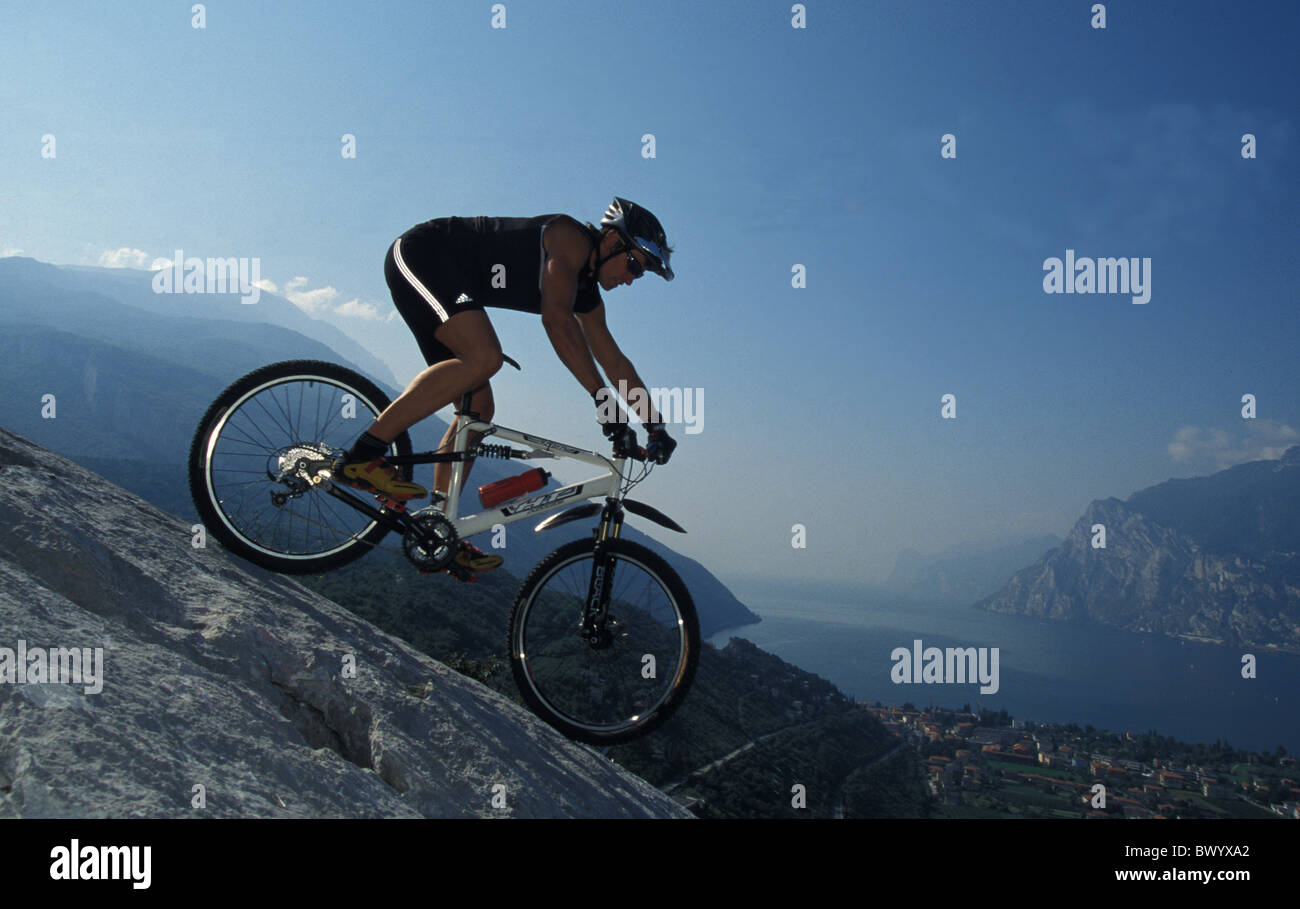 bicycle bike Biking Downhill lake man mountain bike mountains rocks