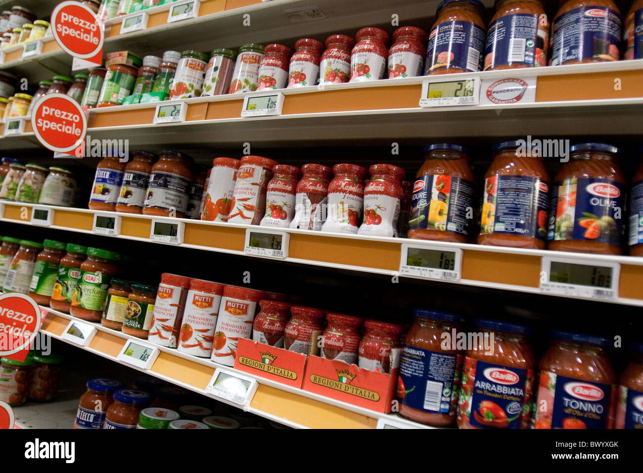stock stack large group tomato sauce tins in Store supermarket market