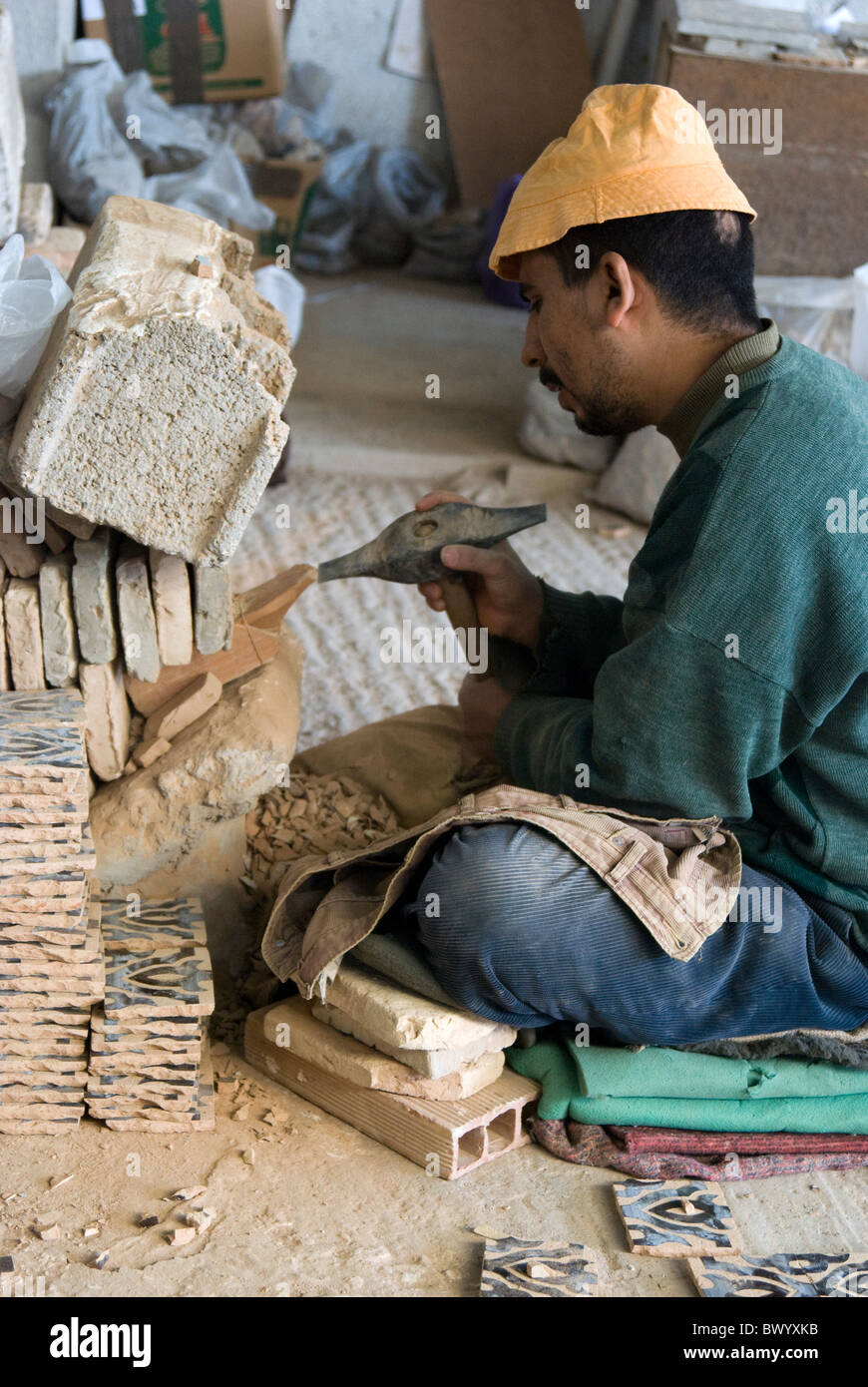 Ceramic factory in Fez, Morocco. Worker Stock Photo