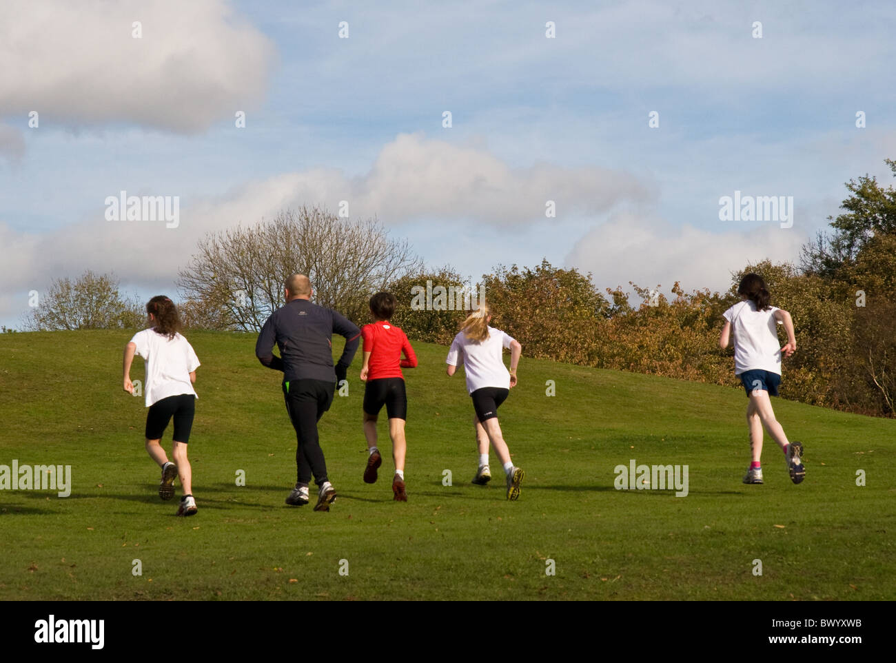 Young athletes and trainer, Heaton Park, Manchester, UK Stock Photo Alamy