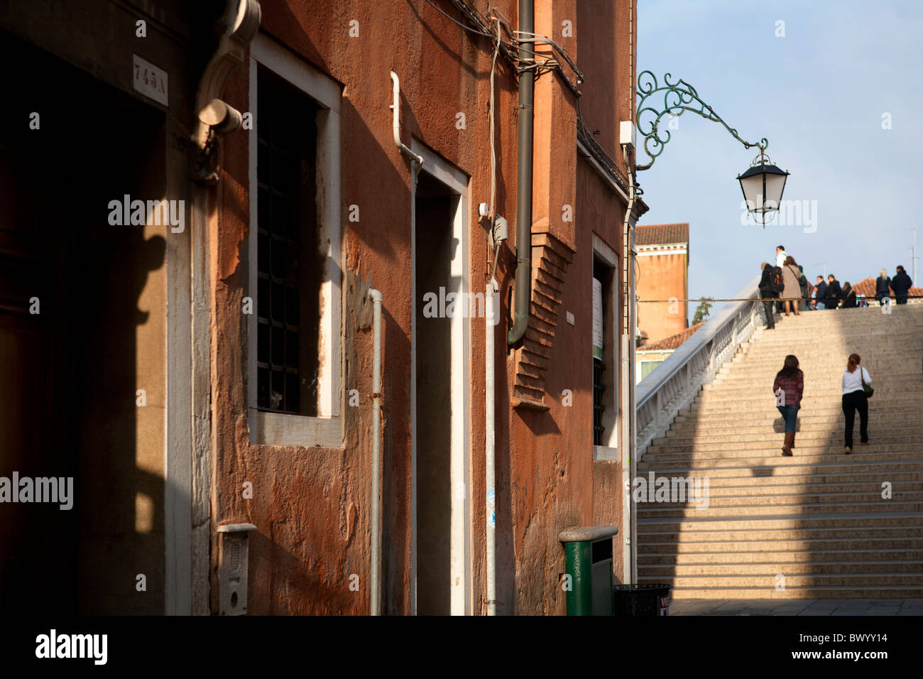 A house just in front of the Ponte degli Scalzi in Venice in the glow of the morning sun. Stock Photo