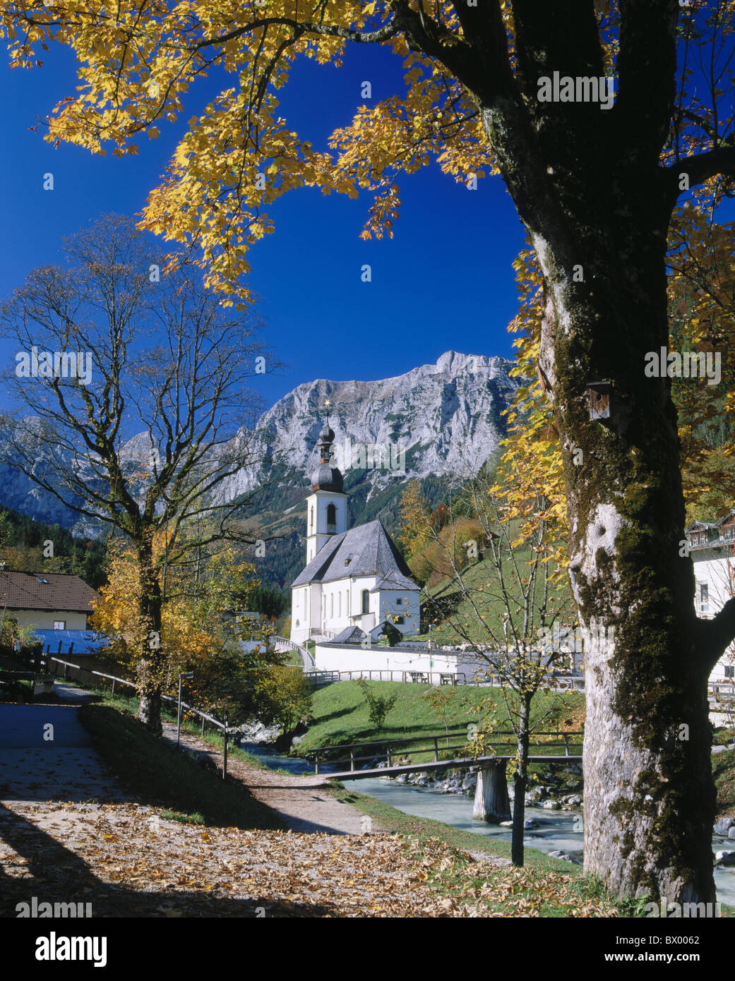 Berchtesgaden land country mountains bridge Germany Europe river flow autumn church Upper Bavaria Ramsau Stock Photo