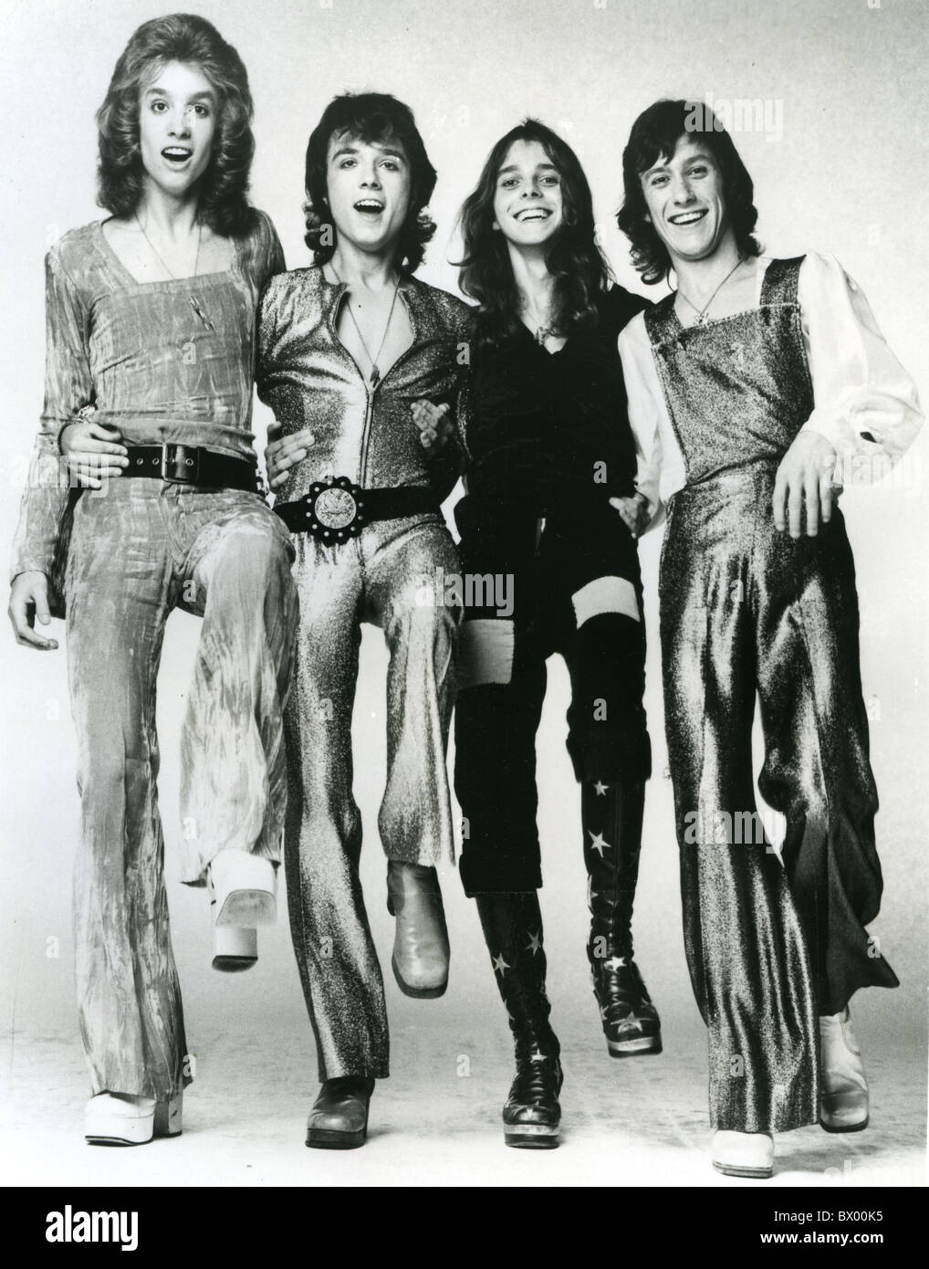 HELLO Promotional photo of UK glam rock group about 1972 from l: Bob  Bradbury, Jeff Allen, Keith Marshall and Vic Faulkner Stock Photo - Alamy