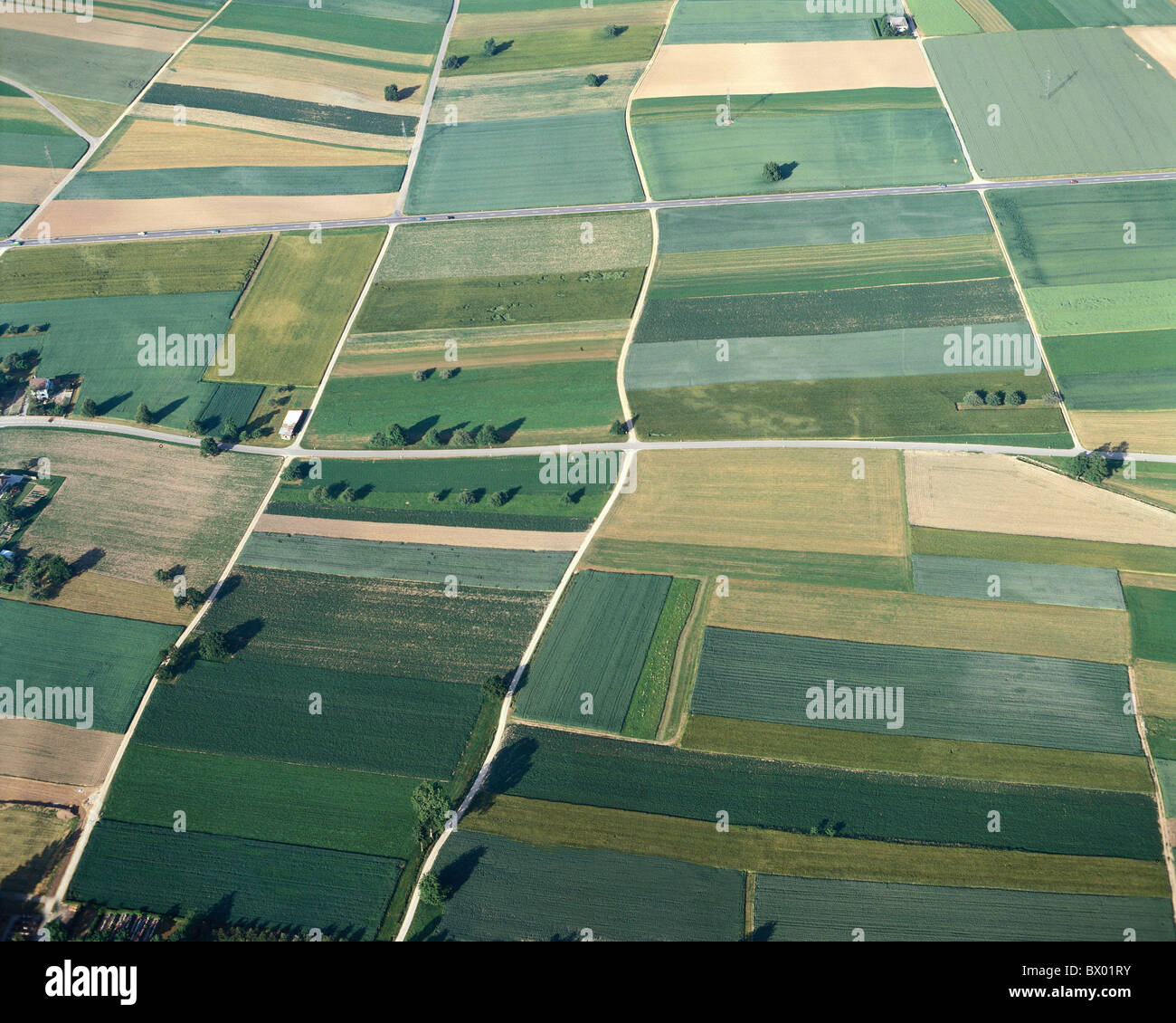 fields surfaces agriculture aerial photo aerial view Switzerland Europe streets structure Stock Photo