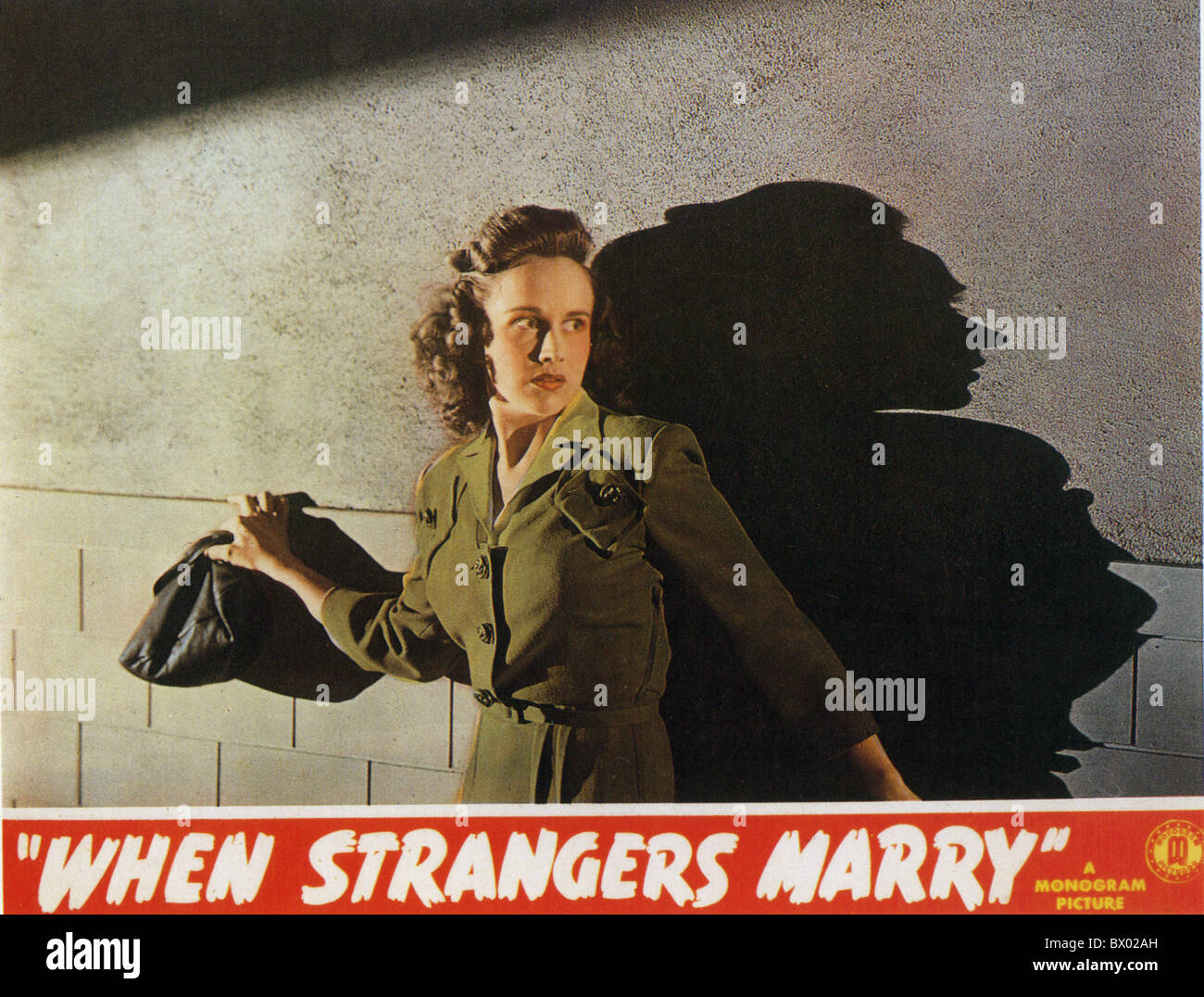 WHEN STRANGERS MARRY Poster for 1944 Monogram film with Kim Hunter Stock Photo