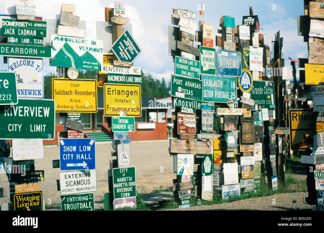 Canada North America local signs collection signs boards collecting many Watson lake worldwide Yukon Stock Photo