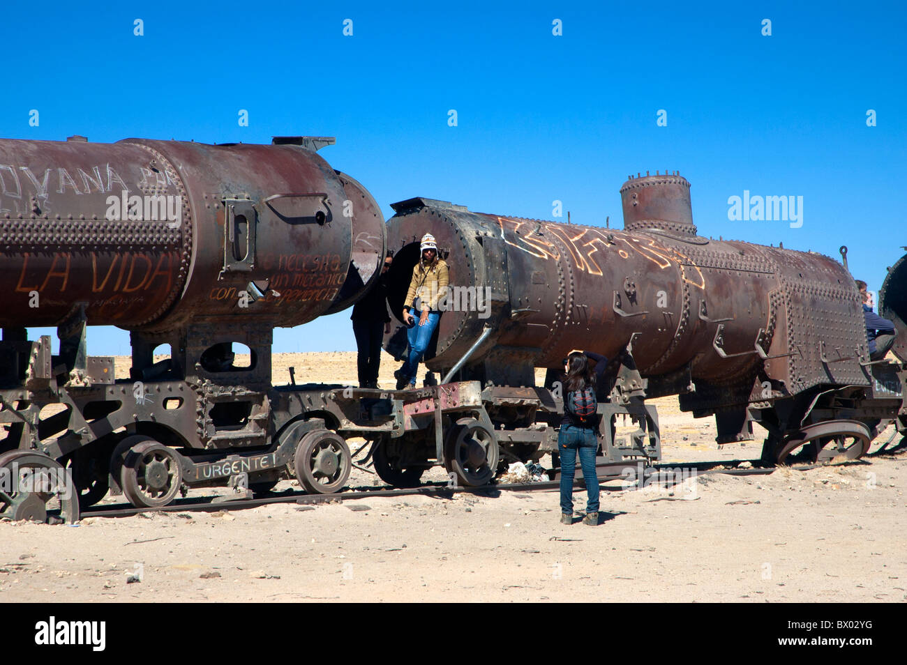 Rusting steam engines at the train and railway graveyard at Uyuni, on the Salar de Uyuni, Bolivia. Stock Photo