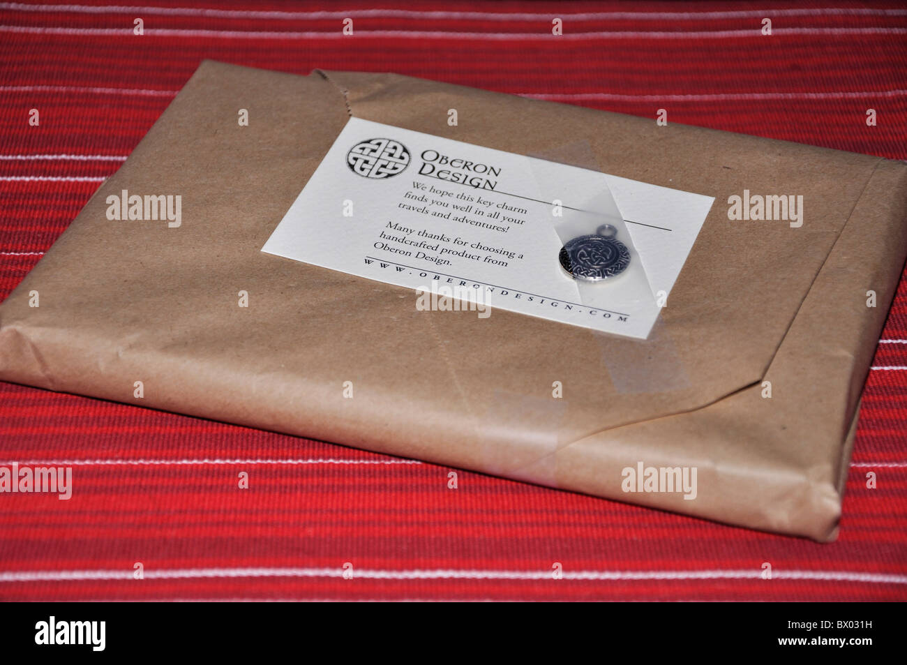 Package wrapped in brown paper Stock Photo Alamy