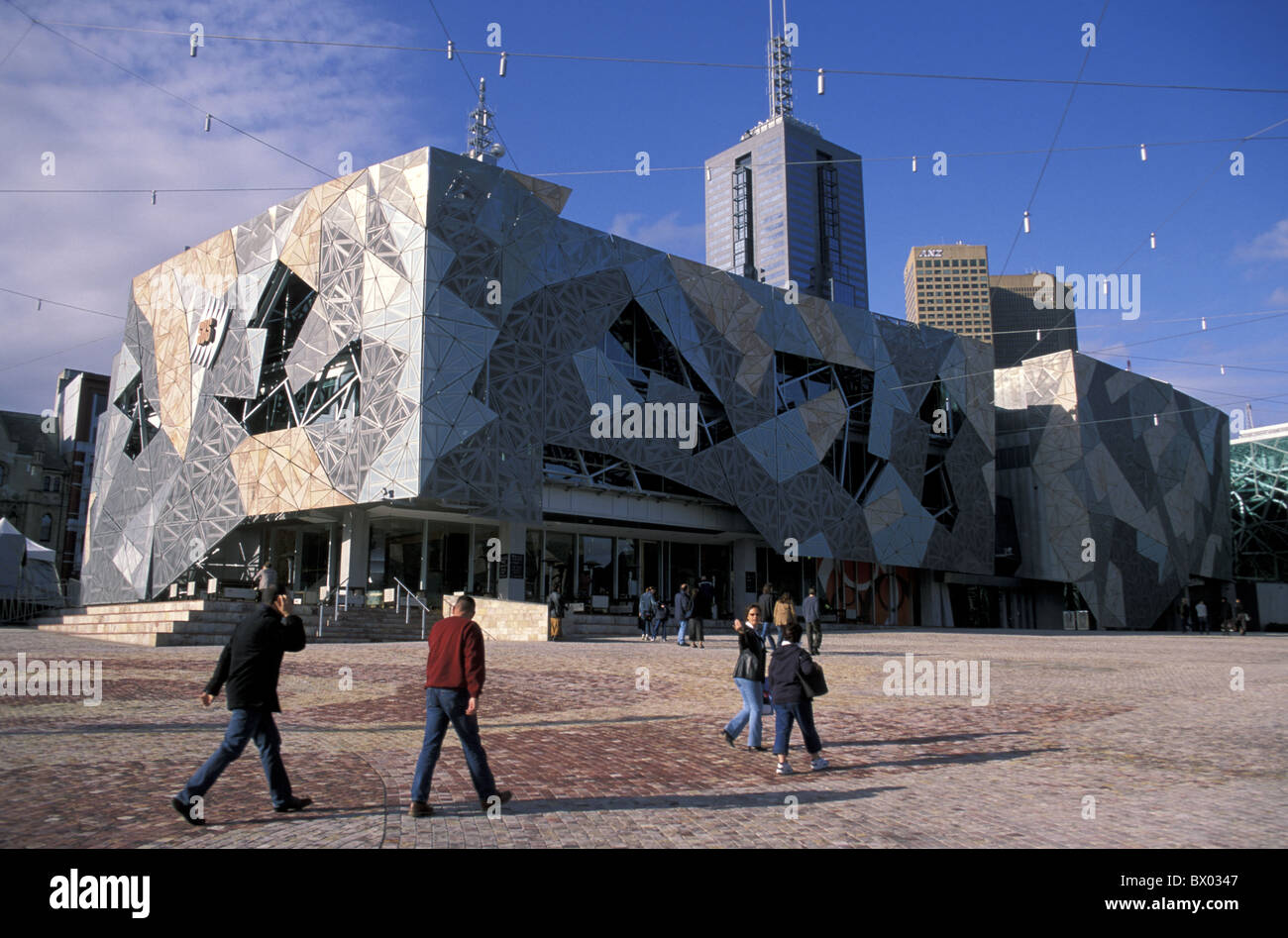Australia Federation Square Melbourne Victoria people modern passerby architecture building culture multip Stock Photo
