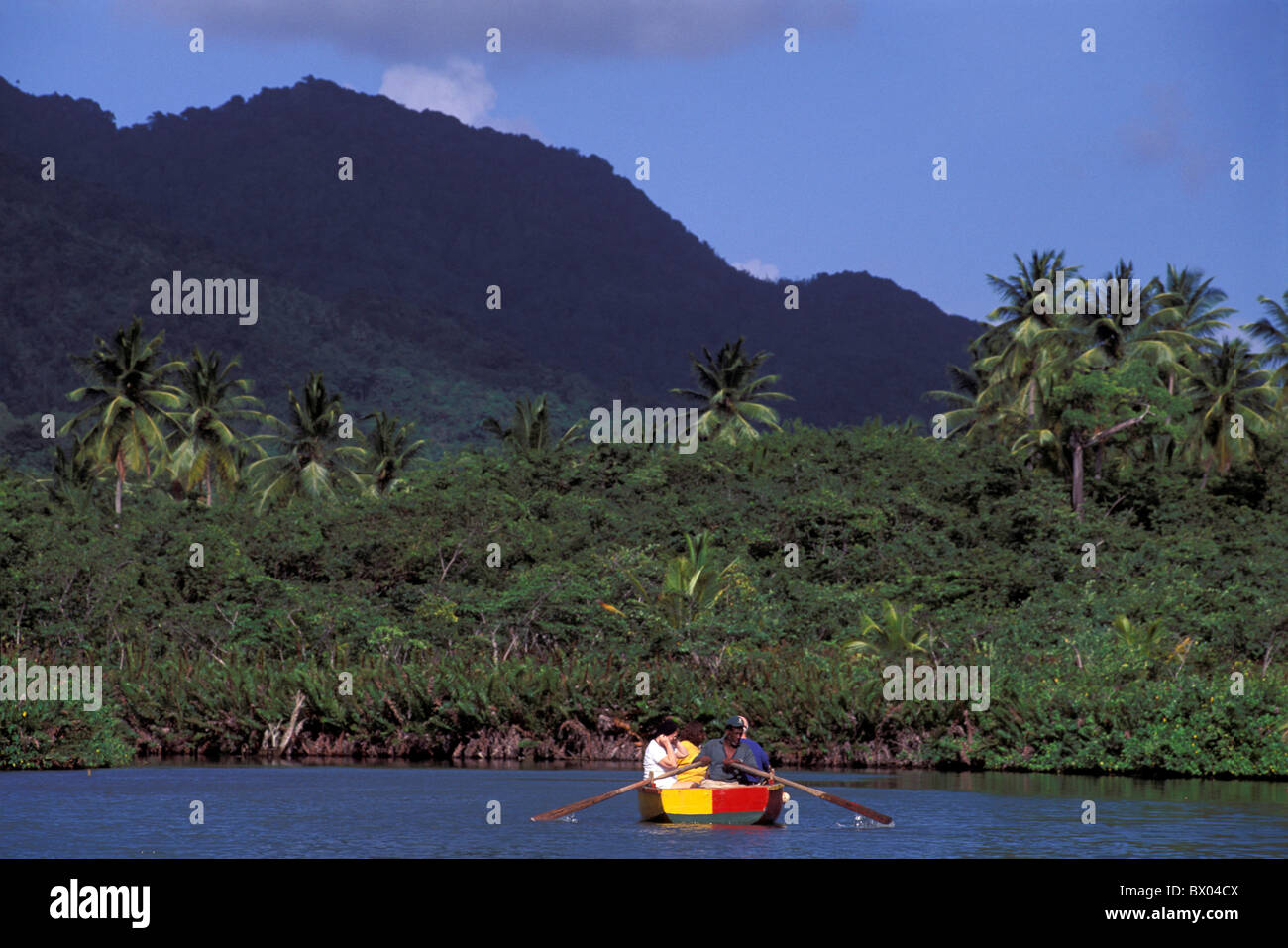 Boat Dominica Indian River mountains no model release rain forest river Rowing boat Caribbean Lesser Antill Stock Photo