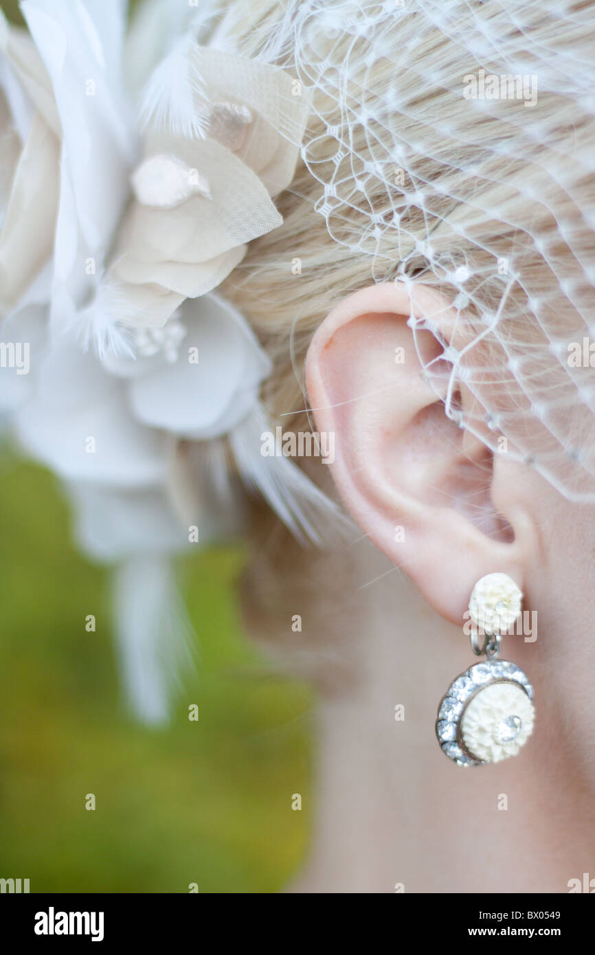 A bride's earring and hairpiece. Stock Photo