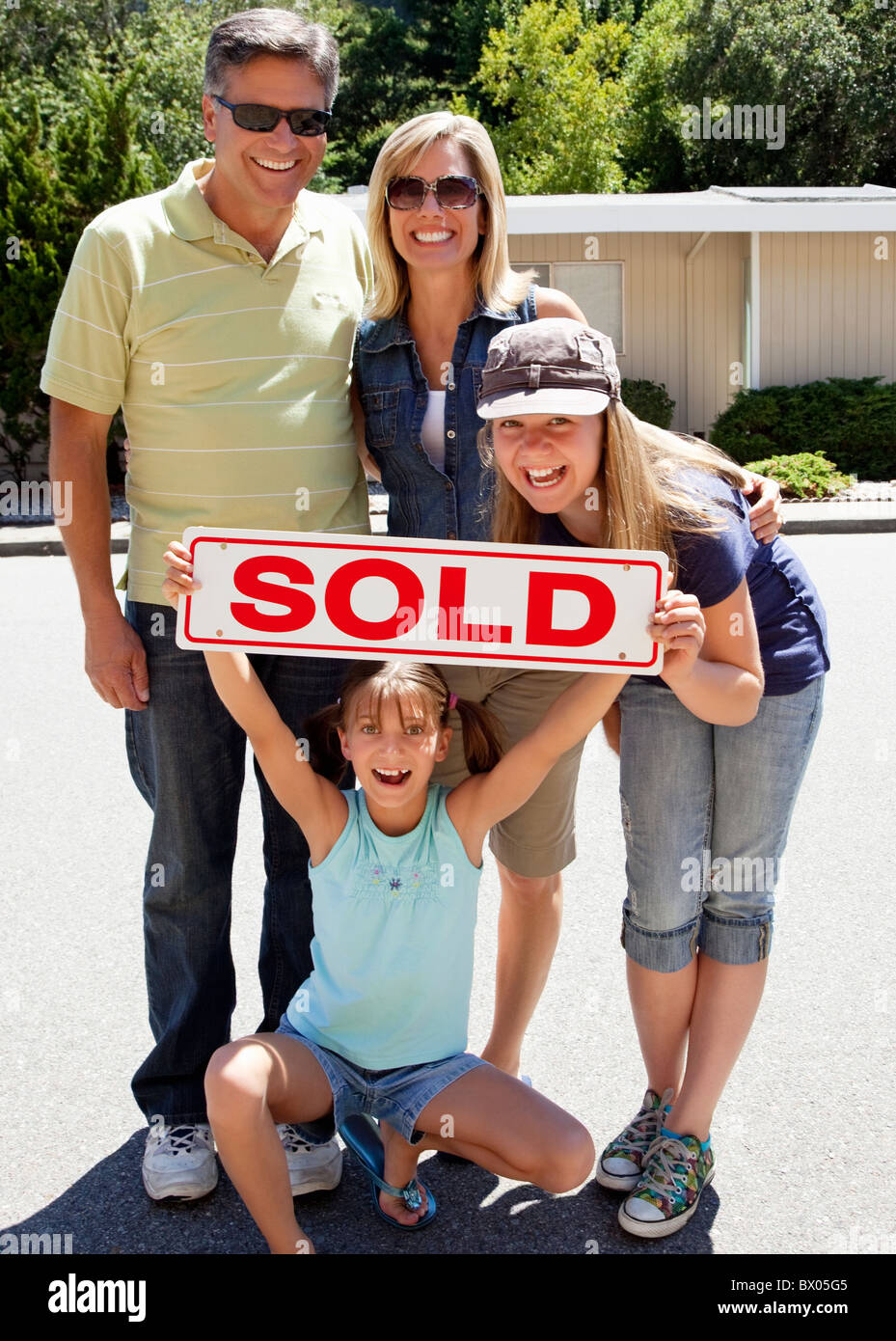 Sold sign three people hi-res stock photography and images - Alamy