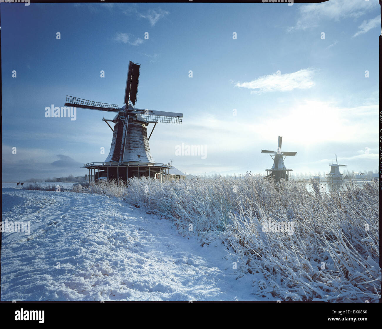 river flow open-air museum Holland scenery fog Netherlands Schans snow windmills winter winter scenery Z Stock Photo
