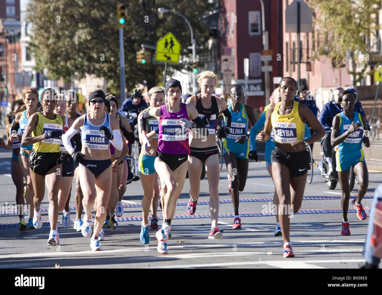 2010: Female front runners at the 10K mark in the New York City Marathon on 4th Avenue in Brooklyn. Stock Photo