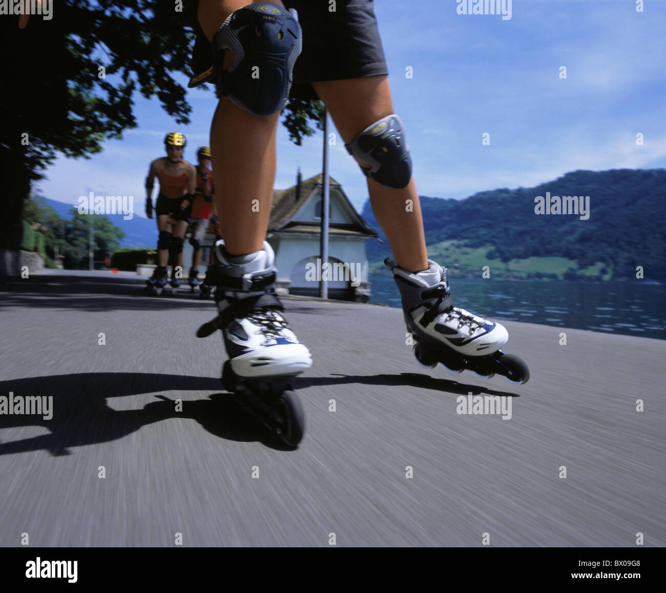 action detail group Inline Skating Switzerland Europe teenager in front  ahead legs Zug lake Zug Rollerbl Stock Photo - Alamy