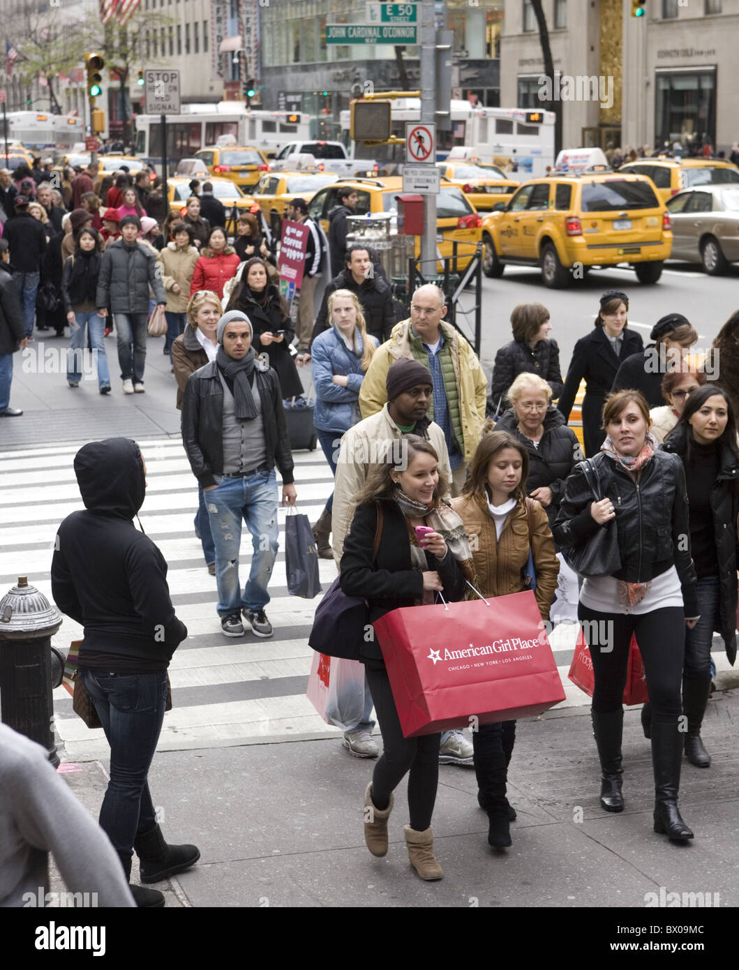 Black Friday, the day after Thanksgiving, known as the busiest shopping day in NYC. 5th Avenue at 51st St. by Rockefeller Center Stock Photo