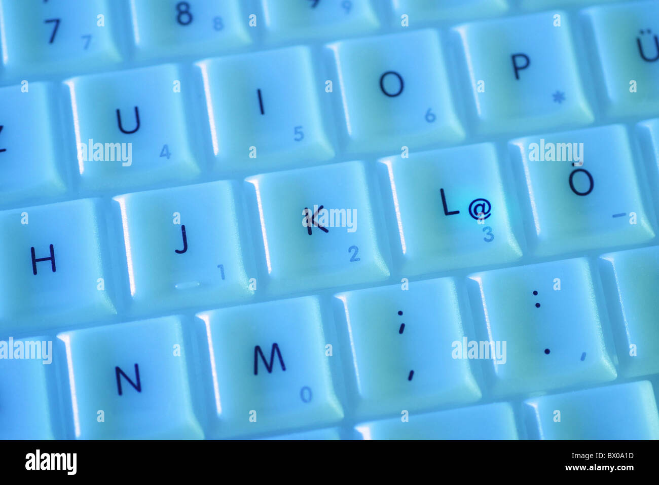 Mail Email 10634870 AT blue computer detail e EDP numbers symbols keyboard keys signs marks figures digits Stock Photo