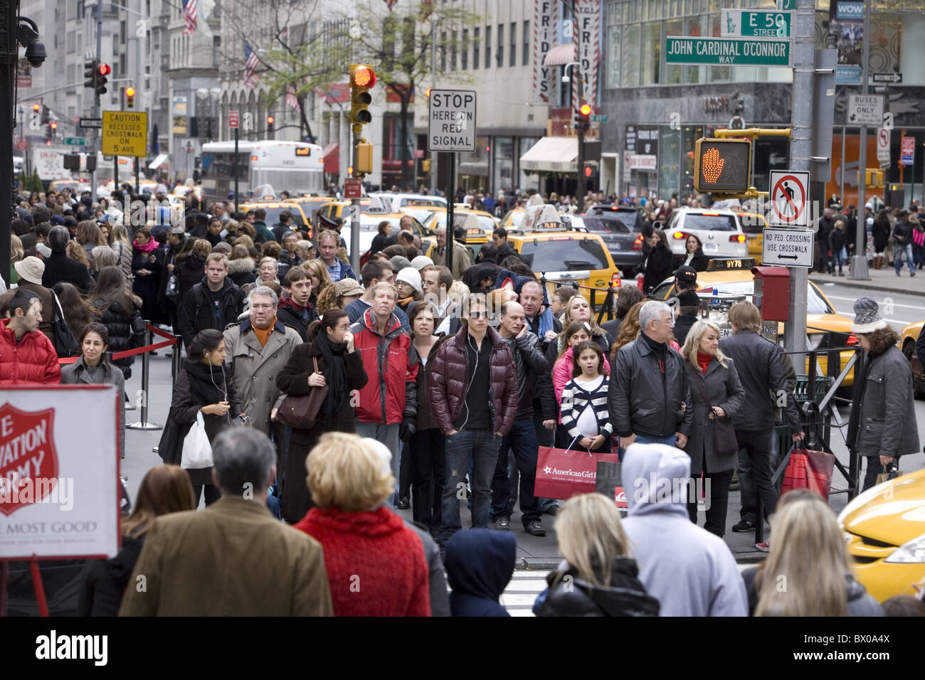 Black Friday, the day after Thanksgiving, known as the busiest shopping day in NYC. 5th Avenue at 51st St. by Rockefeller Center Stock Photo