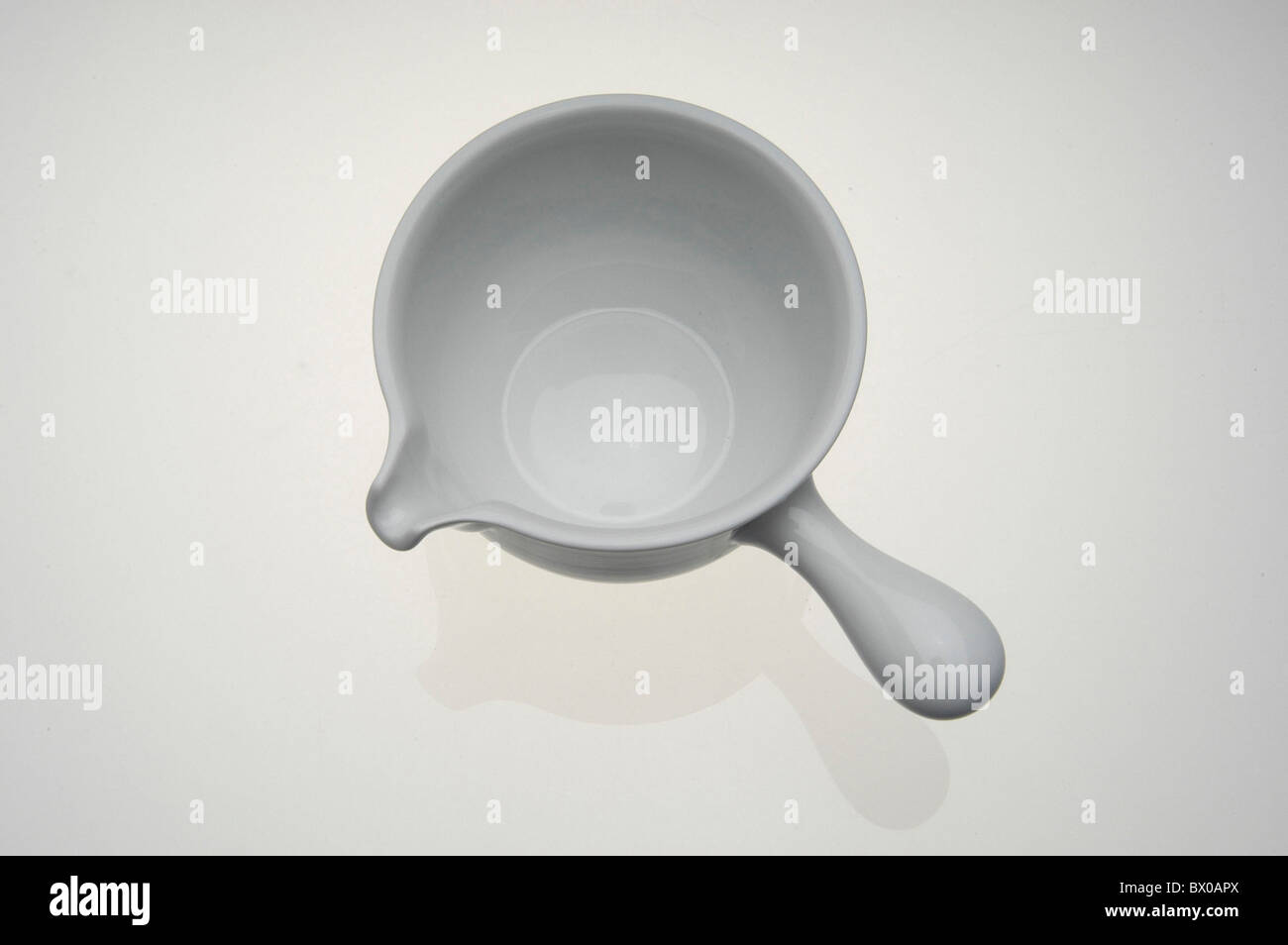 dishes harness clutch handle household budget household appliance pot ceramics porcelain sauces gravies Stock Photo