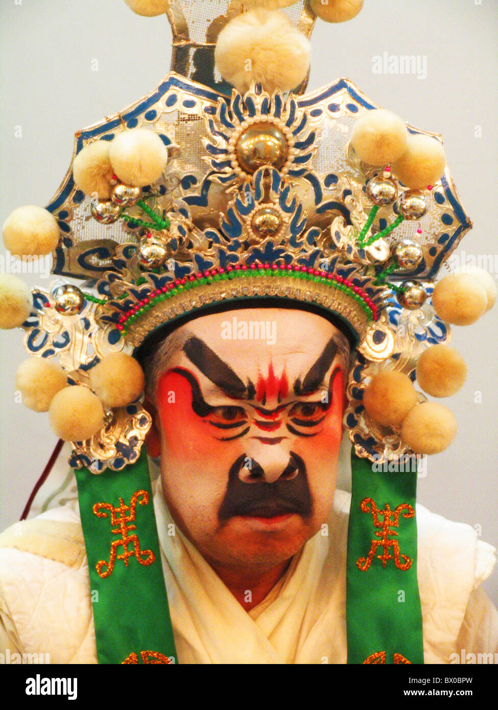 Teochew Opera performer in elaborate makeup and costume