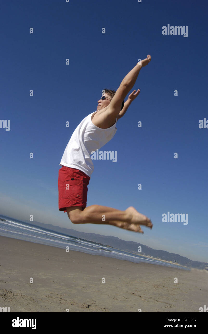 action dynamic joy jumping up joy of life caper jump man sea profile