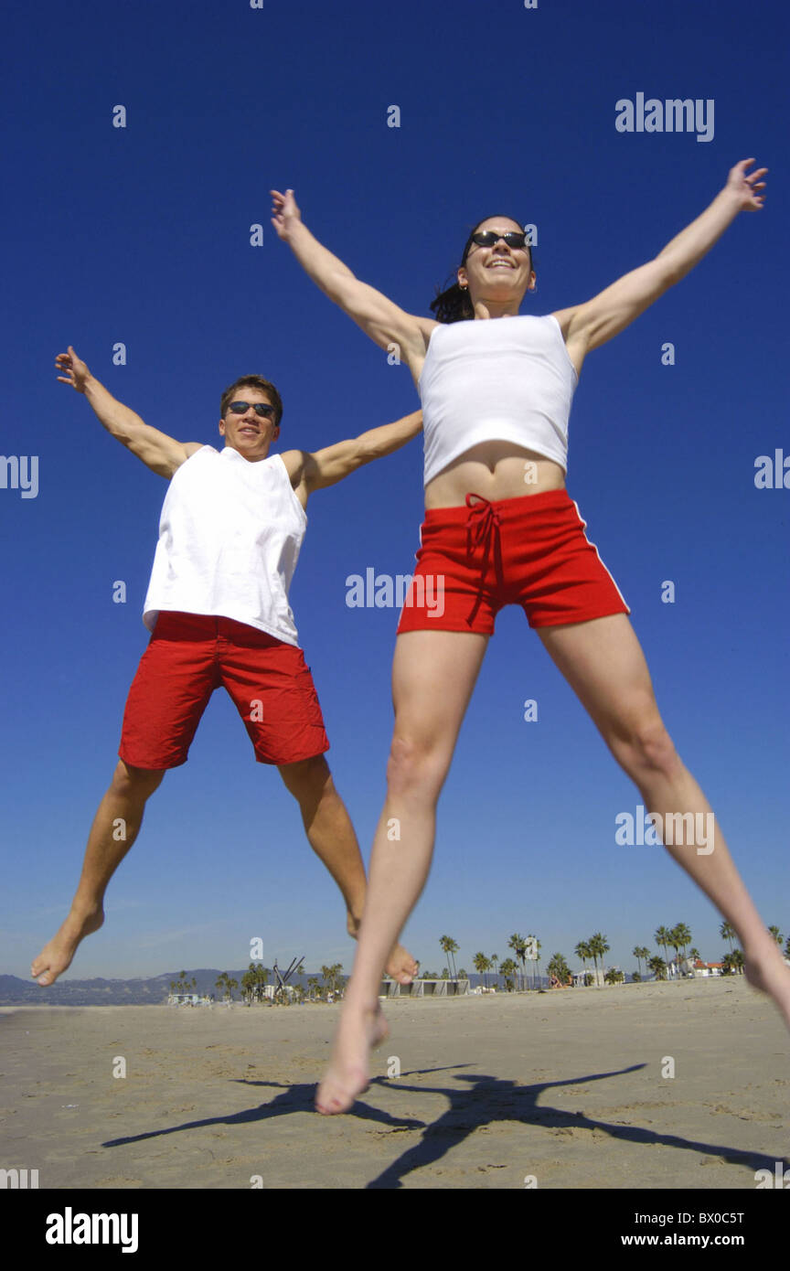 action fitness joy jumping up joy of life caper jump pair couple summer
