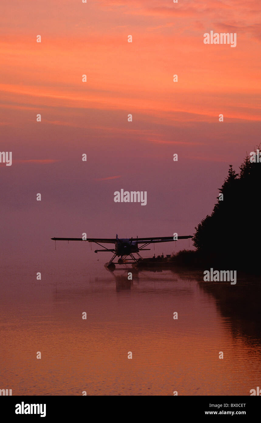 Alaska dusk twilight smoke airplane fly high cheers portrait format Homer idyl scenery morning morning Stock Photo