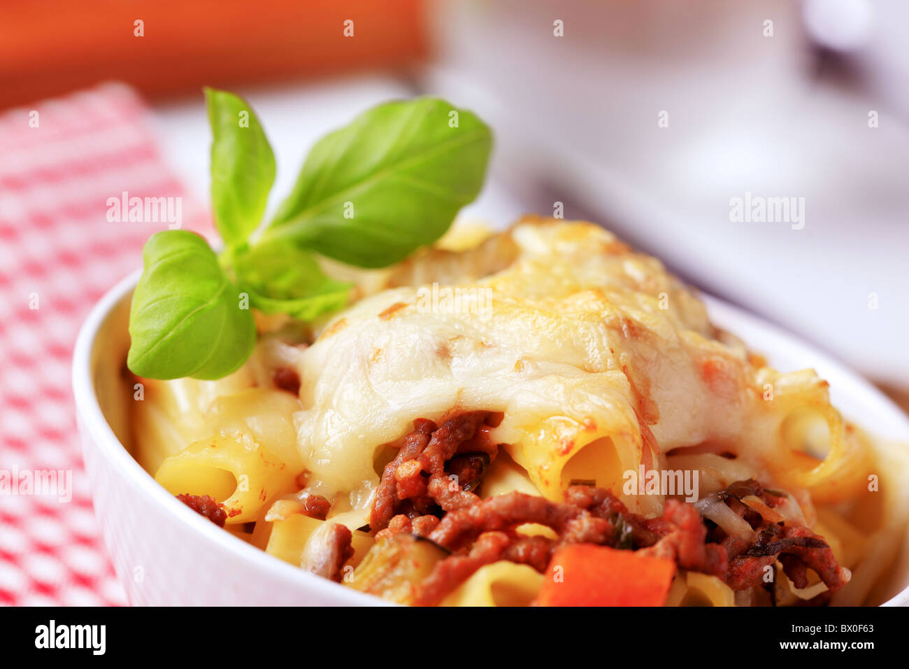 Rigatoni with Bolognese sause and cheese Stock Photo