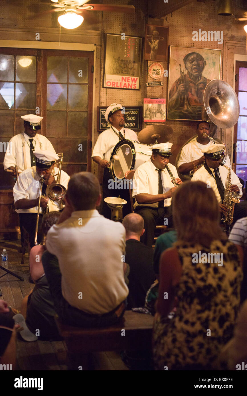 The Paulin Brothers Brass Band plays at Preservation Hall in New Orleans, Louisiana Stock Photo