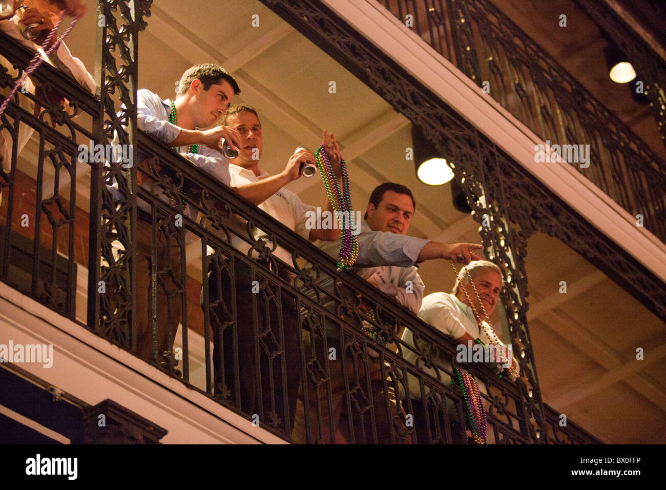 Trees on St. Charles St. Mardi Gras parade route with beads, New Orleans,  Louisiana Stock Photo - Alamy