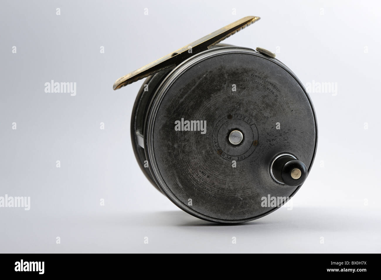 Hardy Perfect antique Salmon fly fishing reel against a plain white background Stock Photo