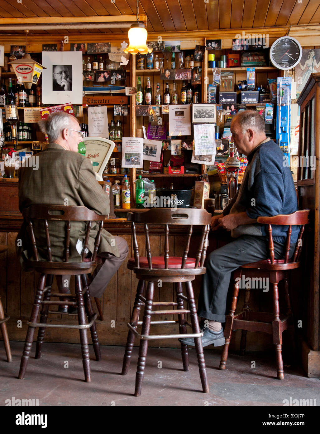 men drinking in traditional Irish pub Caherciveen, County Kerry Ireland Stock Photo