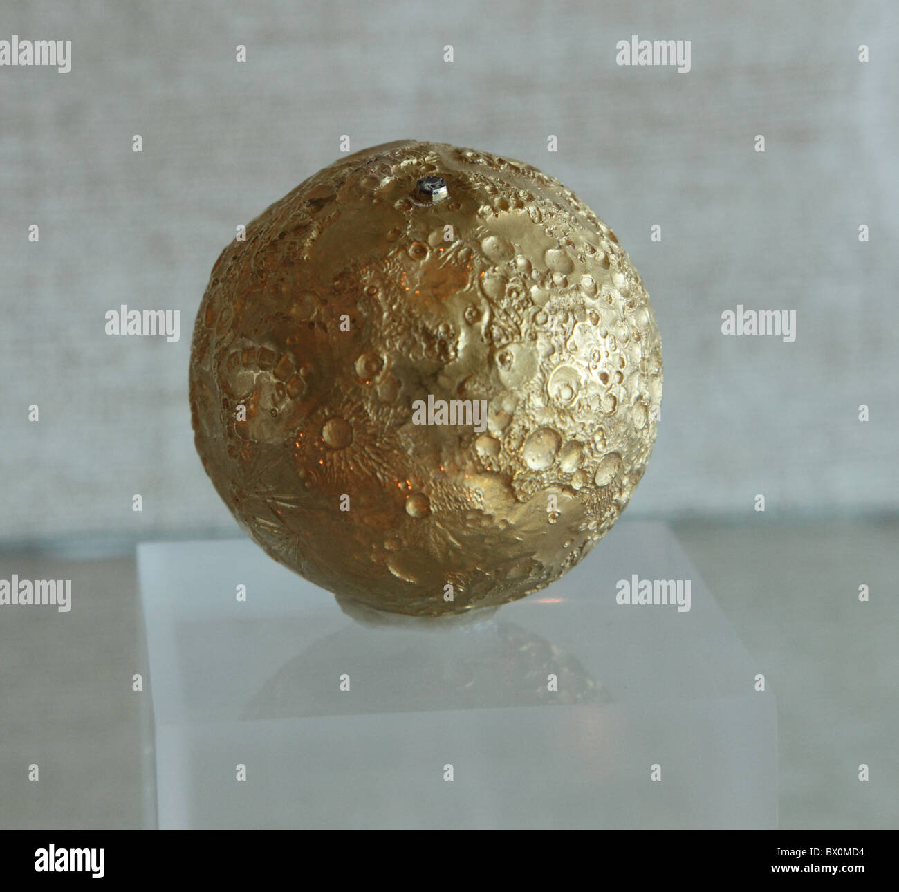 miniature gold moon, diamond marking landing spot, LBJ Library, Austin Texas Stock Photo