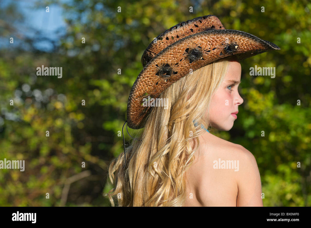 Cowboy with blonde hair and hat - wide 10