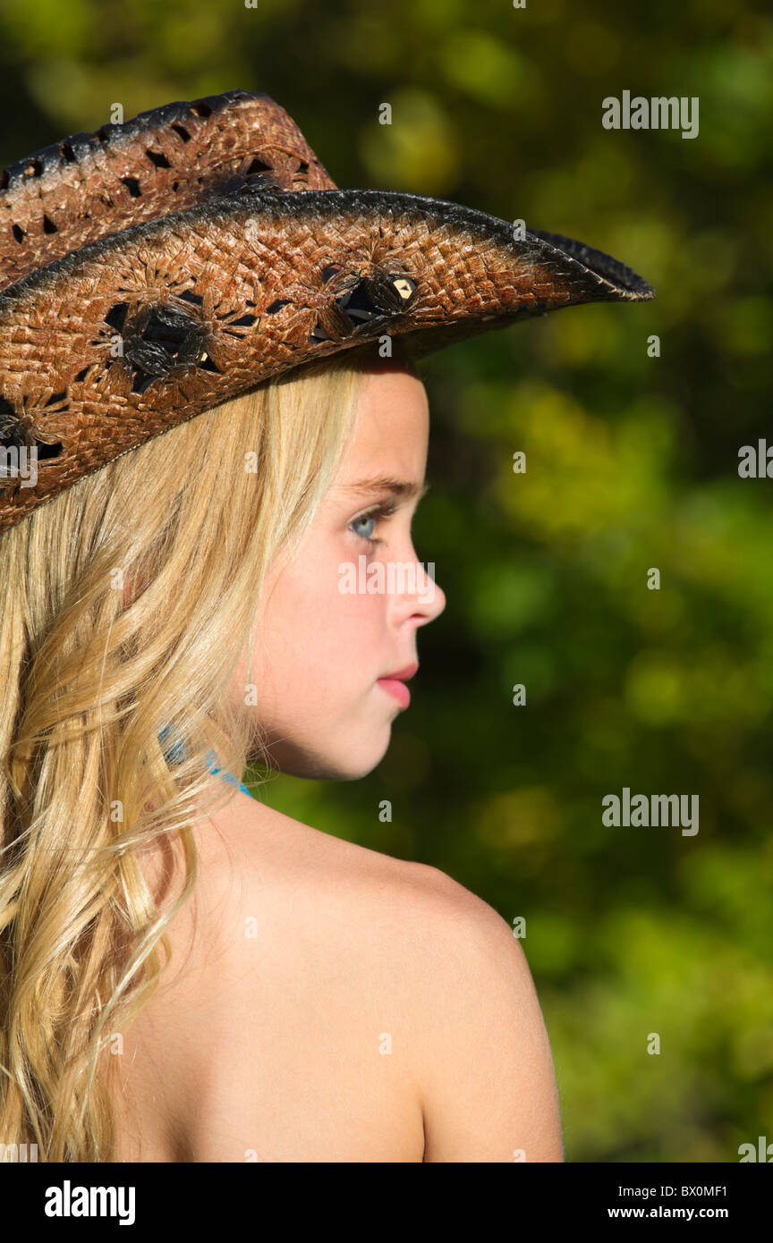 Young Pretty Cowgirl With Beautiful Long Blond Hair Wearing A