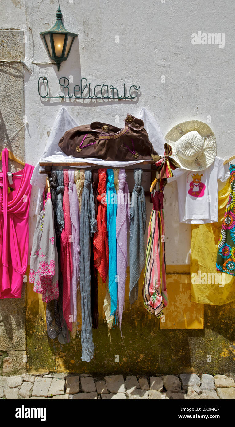Clothes Shopping in the Medieval Village of Obidos Stock Photo