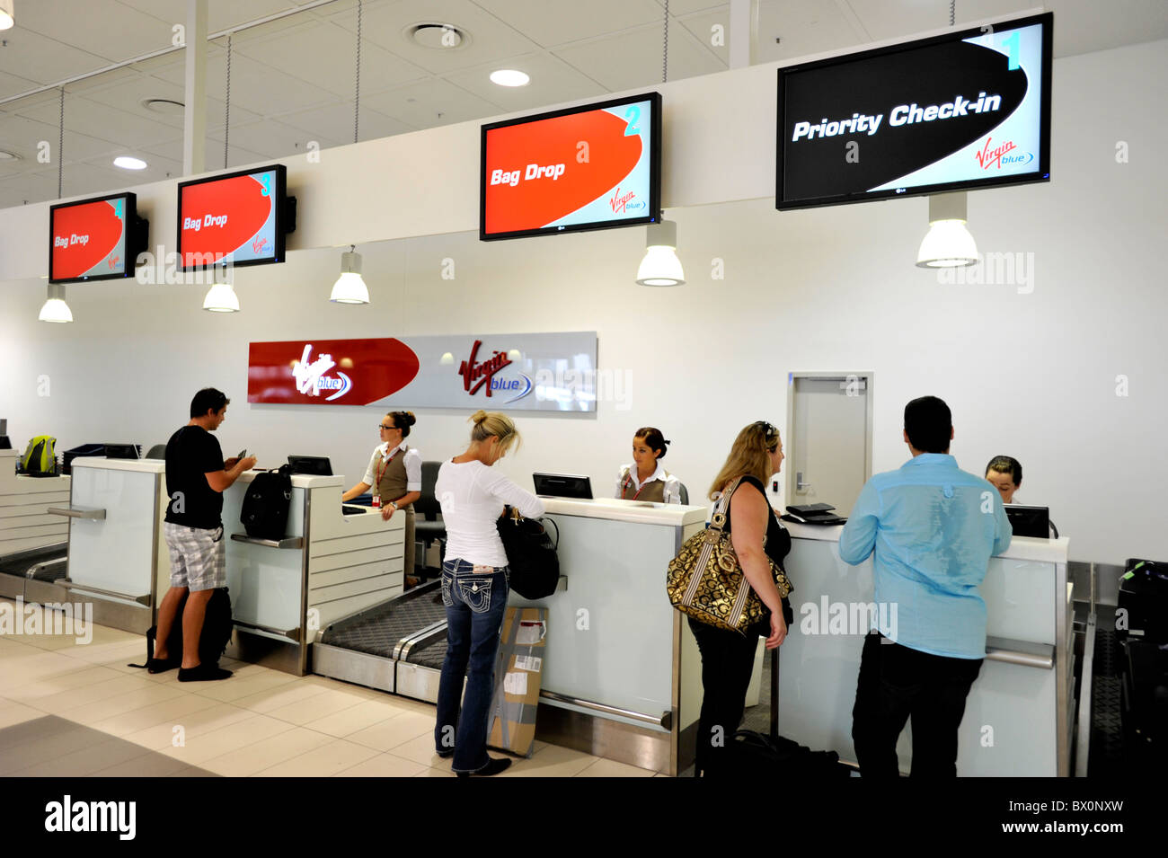 Priority Check-in at the Virgin counter at Gold Coast Airport Australia Stock Photo