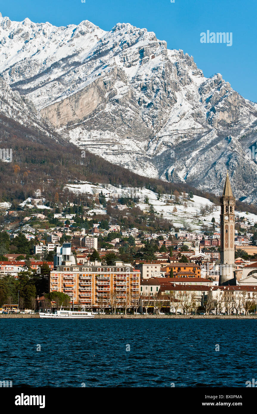 Winter view of city of Lecco with the snowy Alps in the background, Lake Como, Lombardy, Italy Stock Photo
