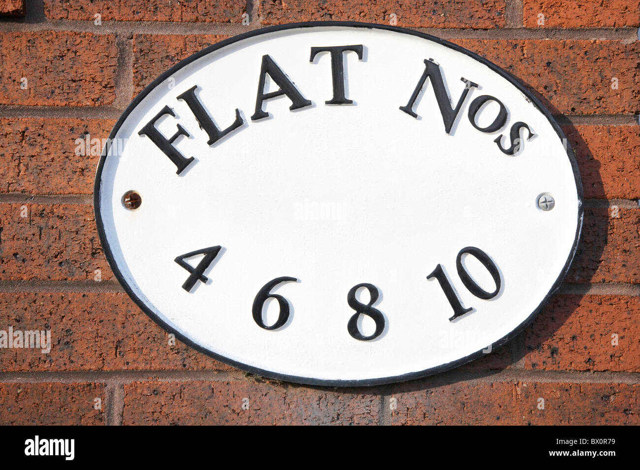 Four six eight ten outside wall close up england uk numberplate hires