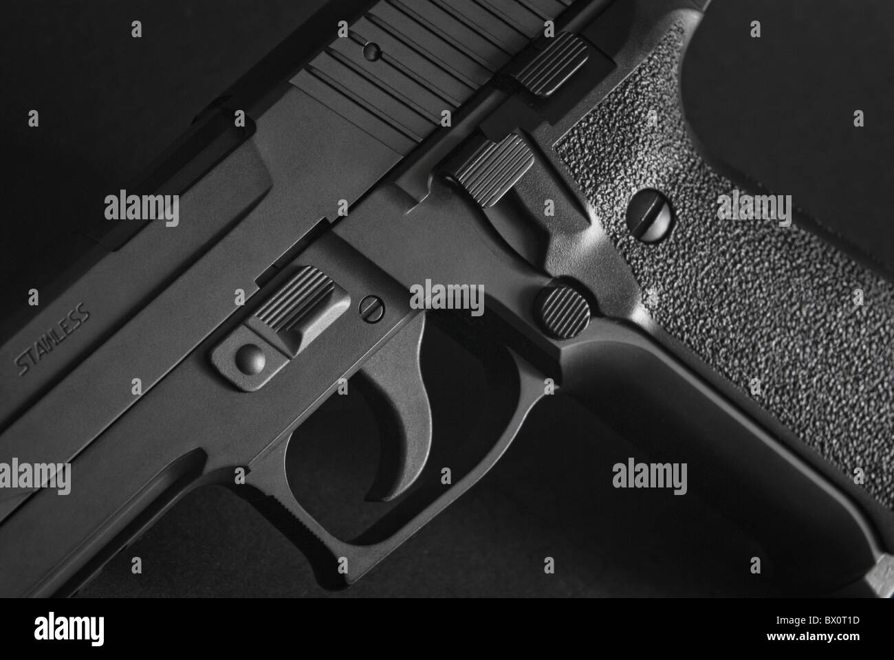 close up of a black automatic firearm Stock Photo