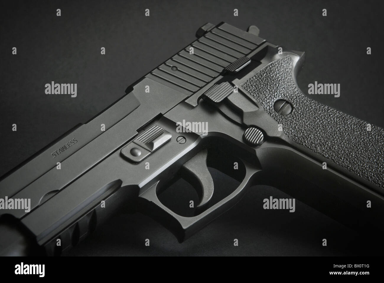 close up of a black automatic firearm Stock Photo